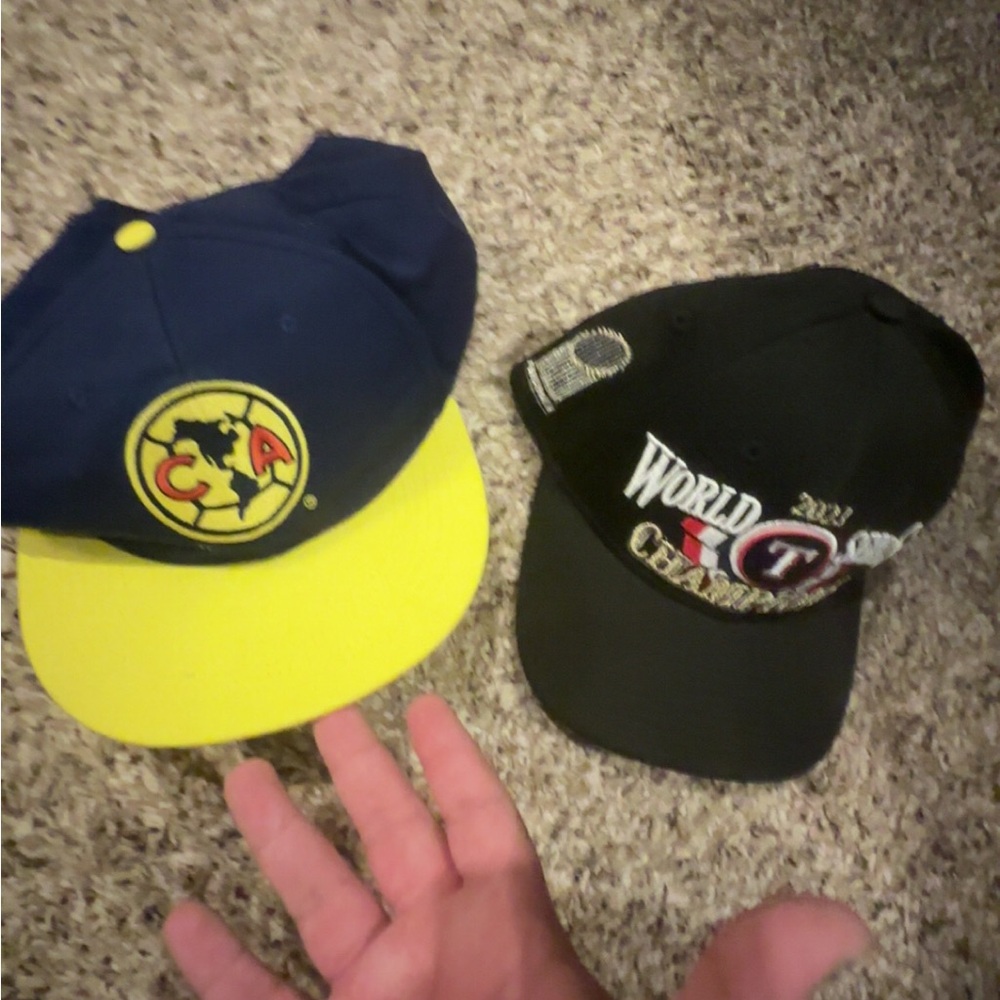 2 used sports hats , excellent condition